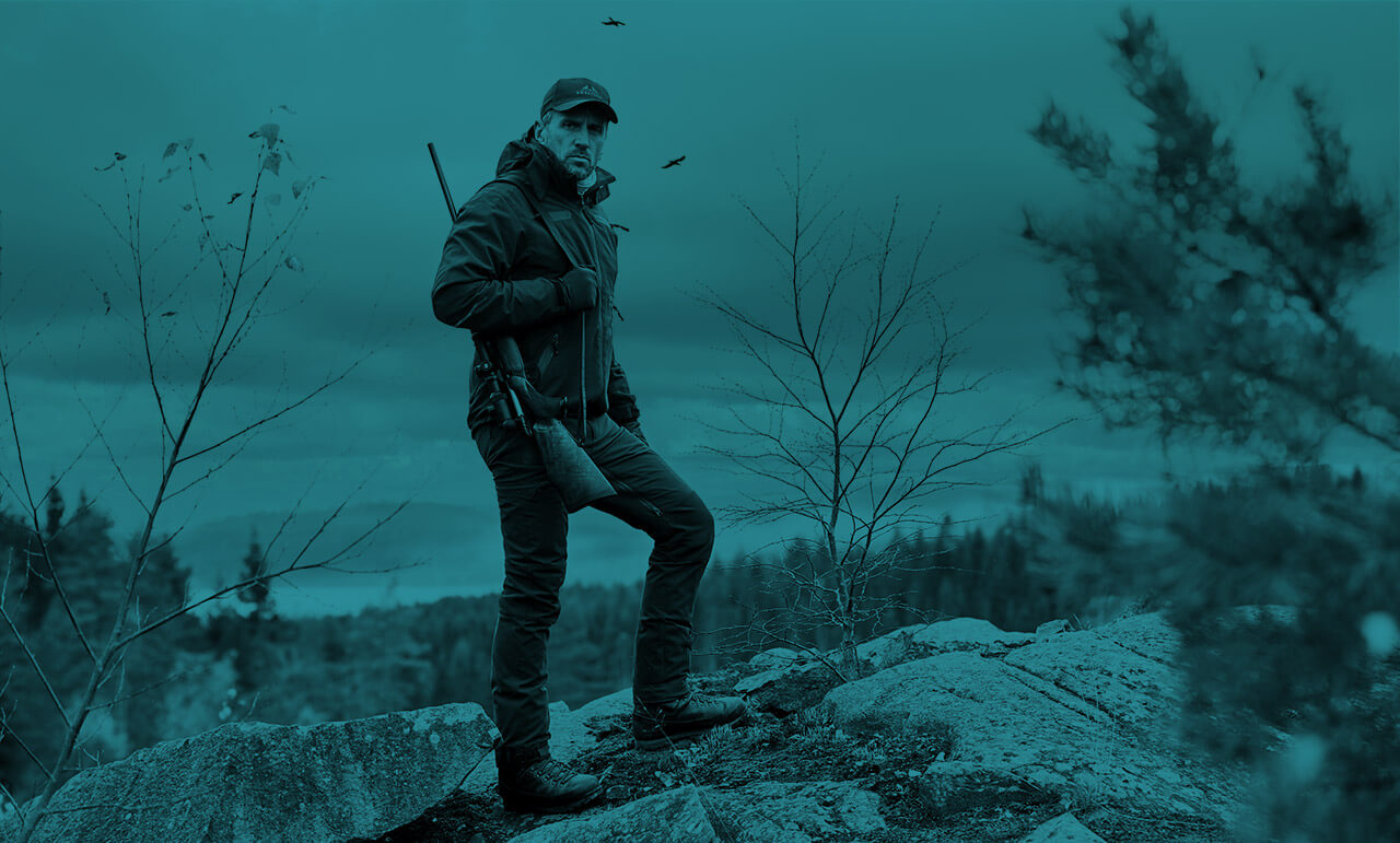 Hunter featuring clothes with NeoNordic membrane